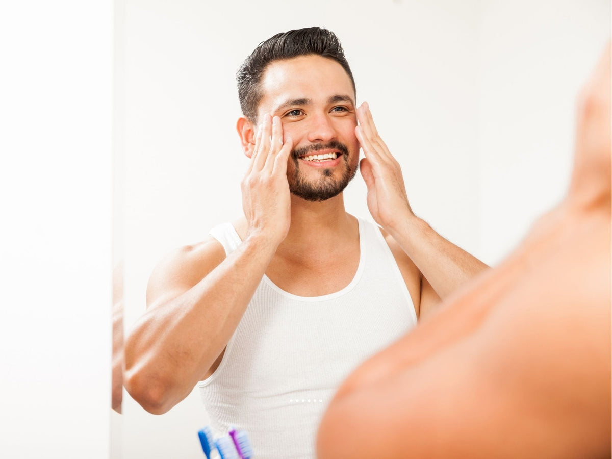 natural skin and hair grooming collection for men, hand made in Lancashire, England from valley Mist. Man looking happy with his skin