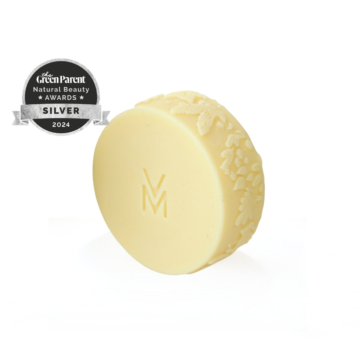 award winning pure massage bar with embossed logo and the valley mist natural skincare with owl and botanical pattern