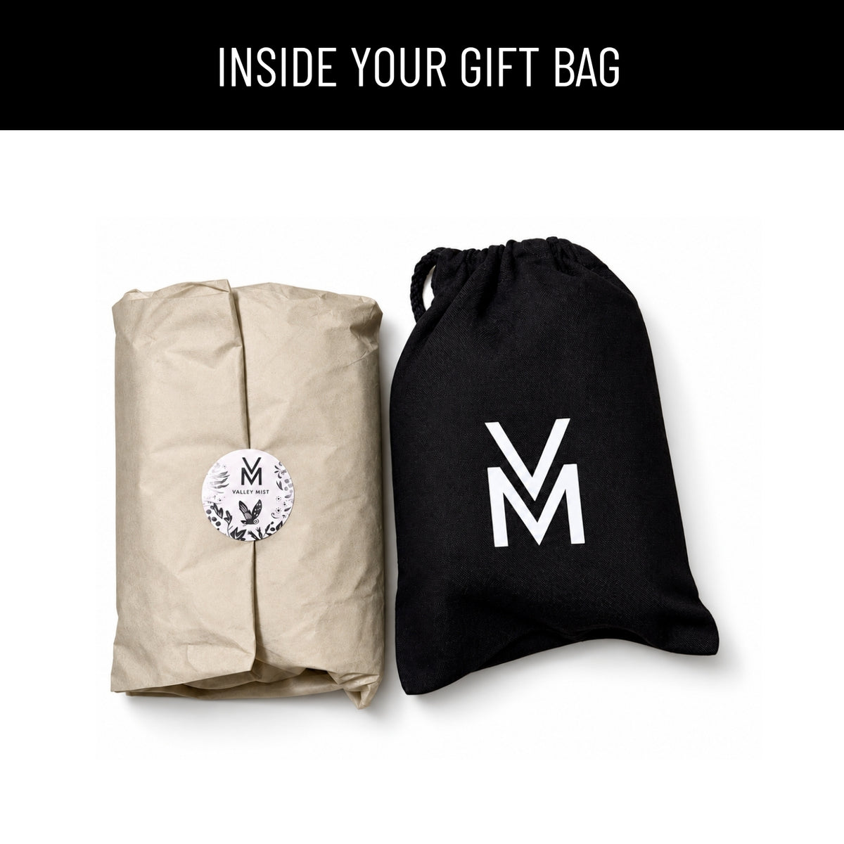 paper wrapped moisturiser and toner inside Valley Mist black cotton gift bag