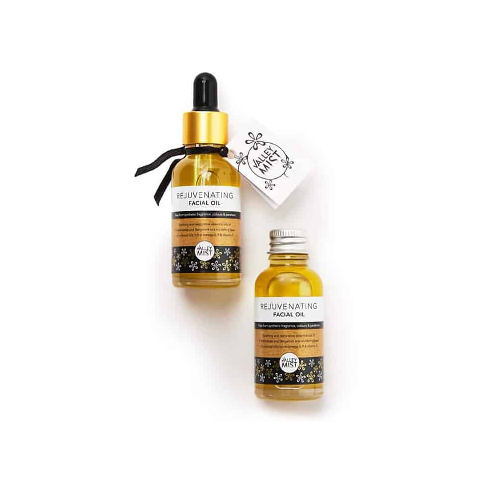 Natural facial oils, a refill bottle with cap and the main option with golden pipette