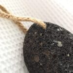 Natural black pumice stone, dense and coarse
