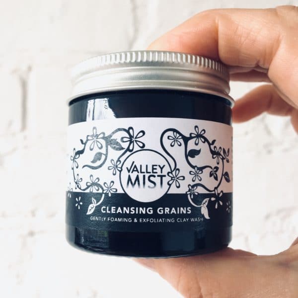 facial wash in amber glass jar