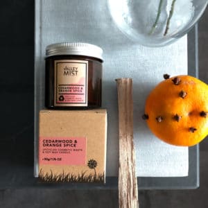 cedarwood and orange spice upcycled candle and natural soy candle from valley mist with orane and cloves