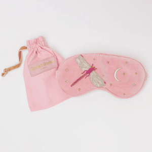 Pink eye mask with dragonfly and moon embroidery, lavender filled for a restful sleep.