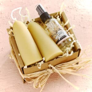 beeswax candle and massage oil gift box