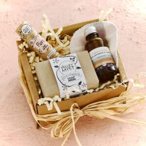 Natural skincare gift box on pink background