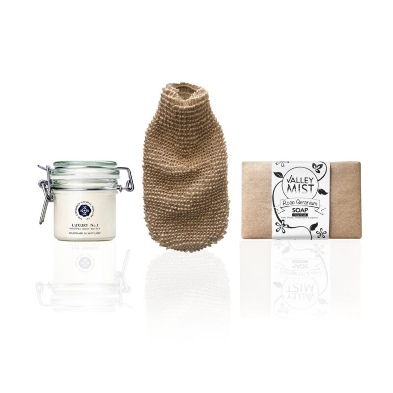 deluxe collection of body butter in glass reusable jar with hand wrapped cold press soap.