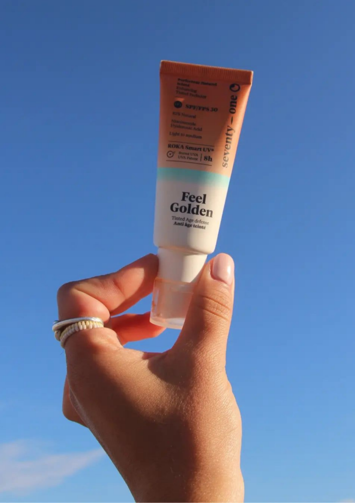 Seventy One Tinted SPF 30 hand held for size